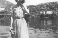 313: Anne McCarthy standing in a dory. (1939)  - daughter of James McCarthy &amp;amp; Julia Reddy